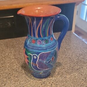 Handcrafted Blue Ceramic Pitcher with Colorful Bird Design